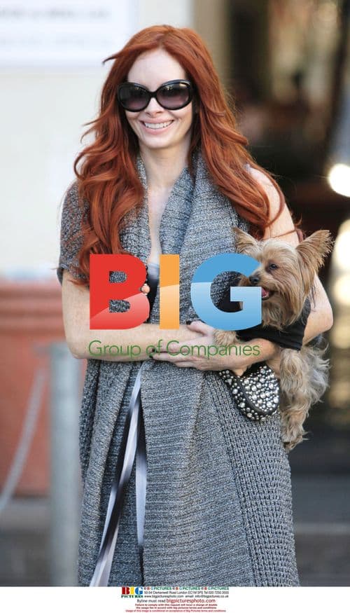 Phoebe Price and her Yorkie "Henry" at Cafe Roma
