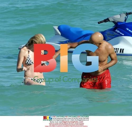 Russell Simmons ogling woman on beach