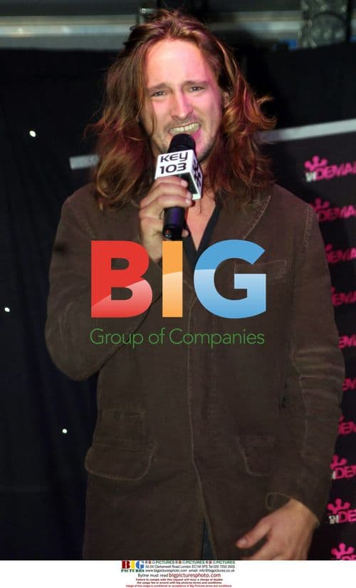 Ben Mills performs at Christmas lights event