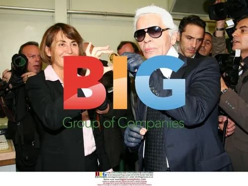 Karl Lagerfeld and Christie Albanel present Chanel gold coin