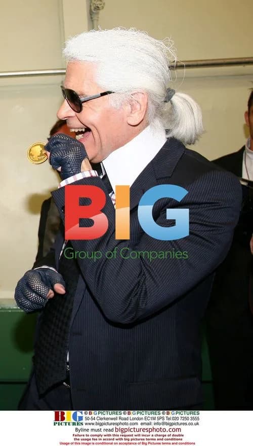 Karl Lagerfeld and Christie Albanel present Chanel coin