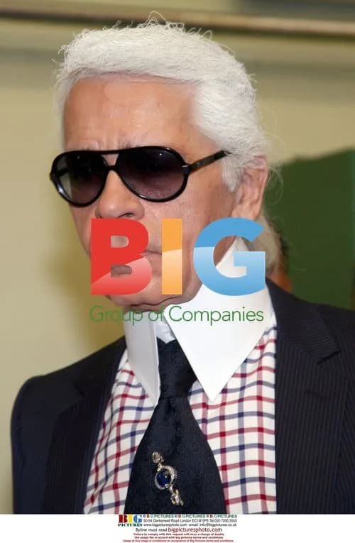 Karl Lagerfeld and Christie Albanel present Chanel coin