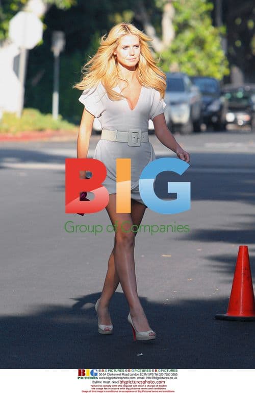 Heidi Klum Shoots Commercial with Dog in Bentley