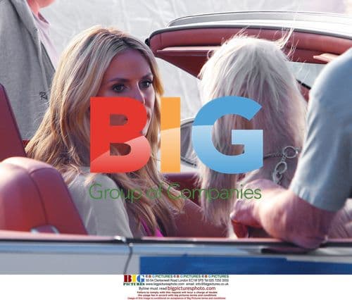 Heidi Klum shoots commercial with dog in Bentley