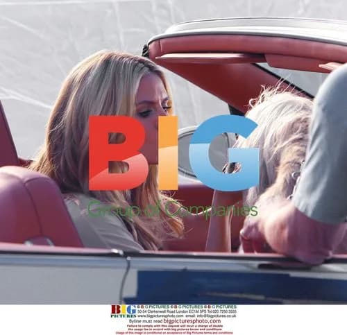 Heidi Klum Shoots Commercial with Dog in Bentley