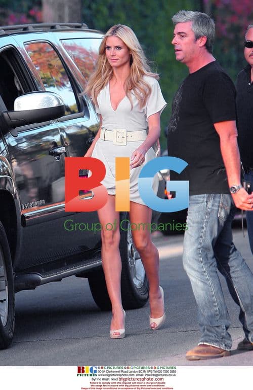 Heidi Klum Shoots Commercial with Dog in Bentley