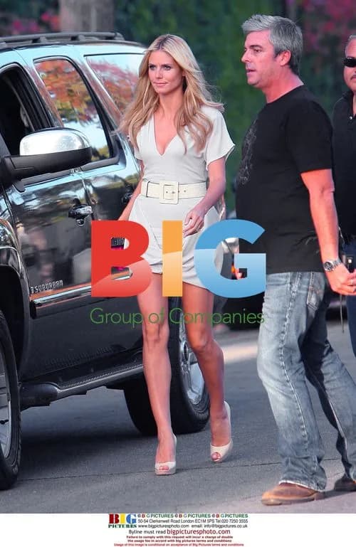 Heidi Klum Shoots Commercial with Dog in Bentley