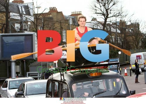 James Cracknell in rowing boat on London cab