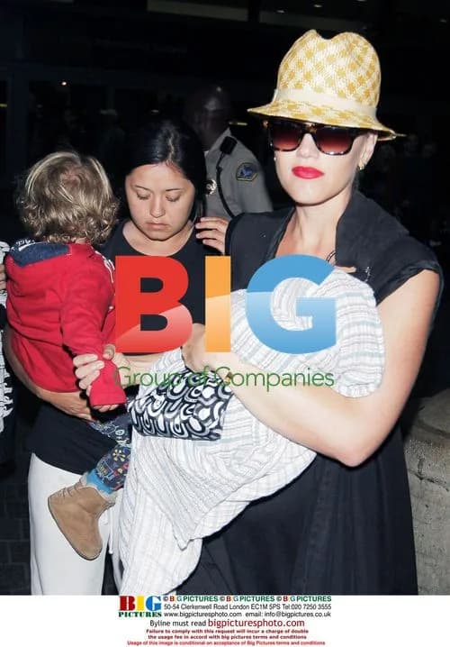 Gwen Stefani and family arrive at LAX