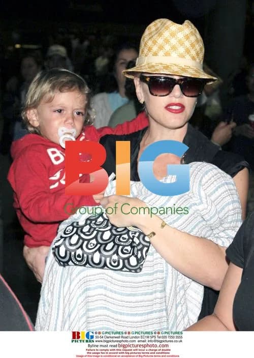 Gwen Stefani and family arrive at LAX from Cabo