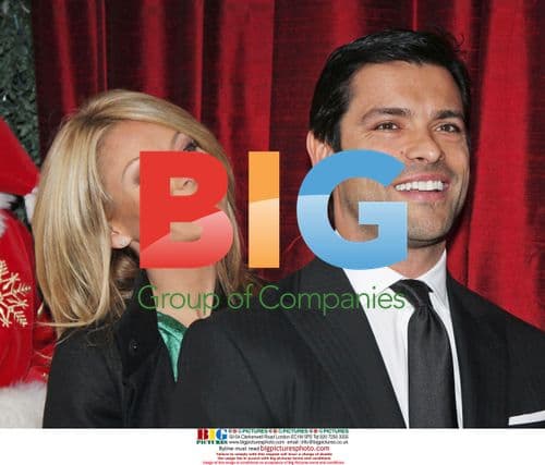 Kelly Ripa, Mark Consuelos and Santa Claus at Cartier event