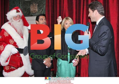 Kelly Ripa, Mark Consuelos and Santa Claus at Cartier event