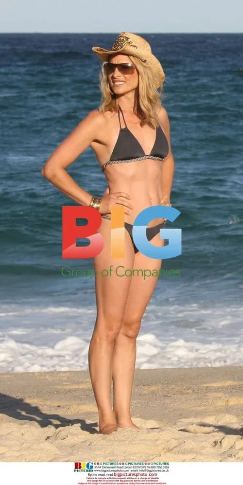 Dani Behr on beach with family in Australia
