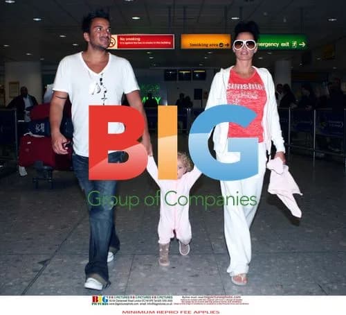 Katie Price and Family Arrive at Heathrow