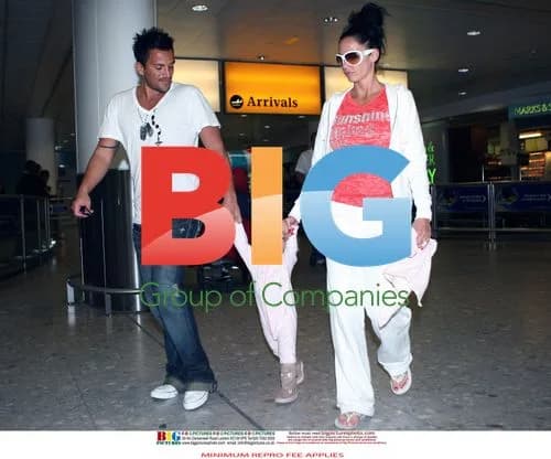 Katie Price and family arrive at Heathrow