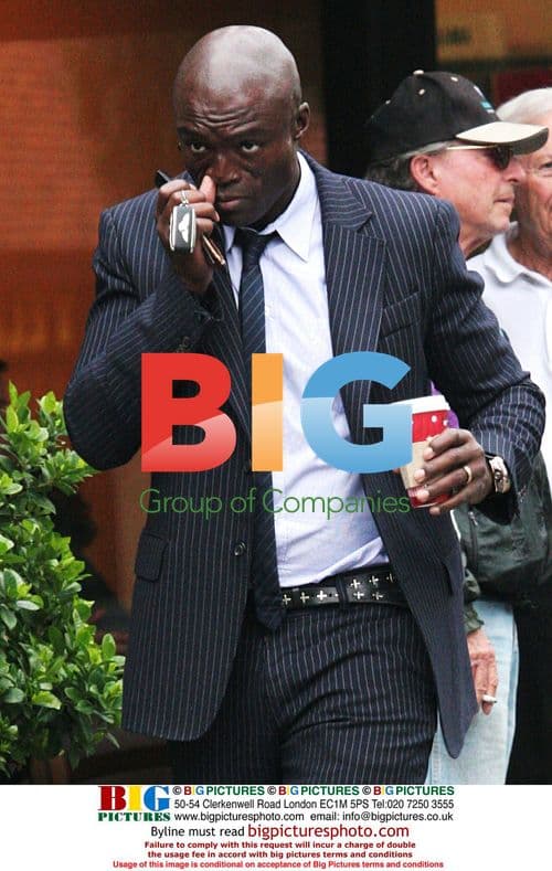 Seal leaves Bel Air Starbucks in a suit