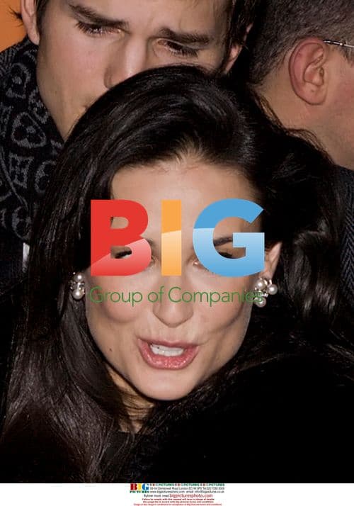 Demi and Ashton at "Flawless" Premiere