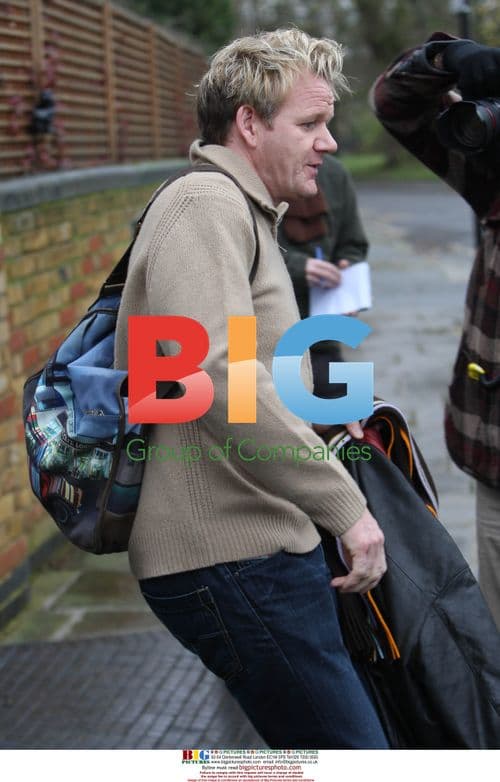 Gordon Ramsay smiles leaving home for TV appearance
