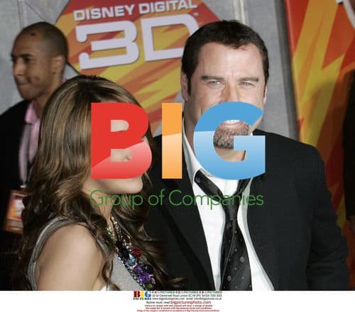 Miley Cyrus and John Travolta at 'Bolt' Premiere