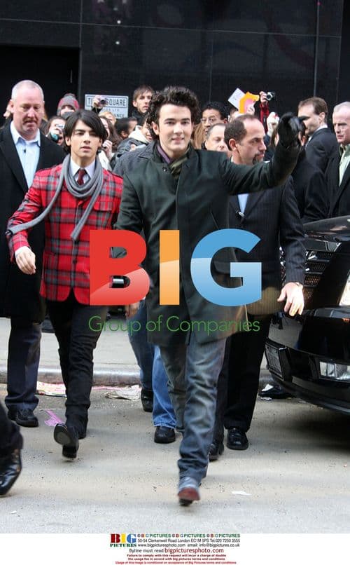 The Jonas Brothers Donate Coats and Cash