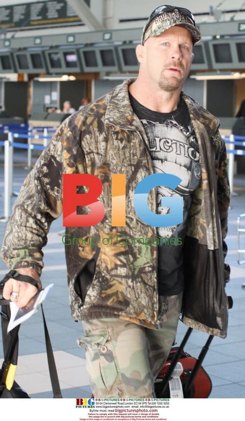 Former WWE Star Steve "STONE COLD" Austin Arrives at Vancouver Airport