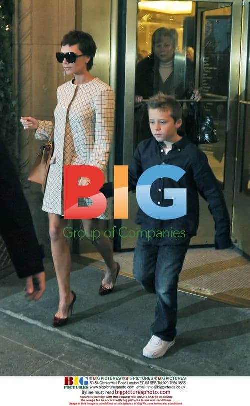 Victoria Beckham and son Brooklyn leave hotel