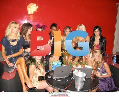 Paris Hilton with cast of new show