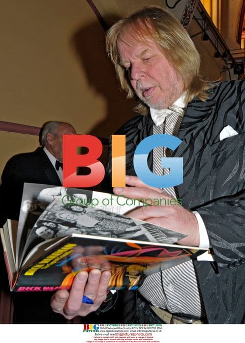 Rick Wakeman with partner's parents at golf club