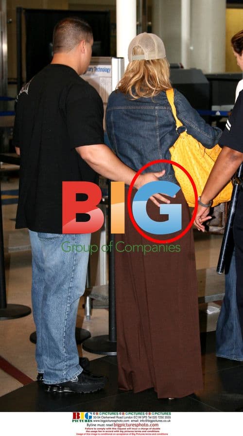 Jessica Simpson Departs LAX with Dog