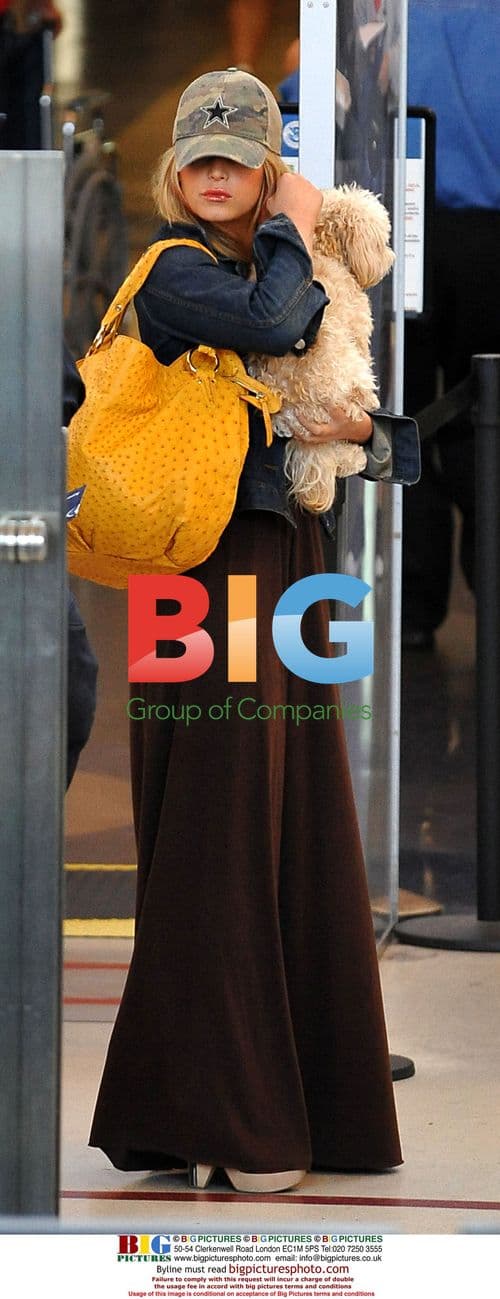 Jessica Simpson and dog Daisy at LAX