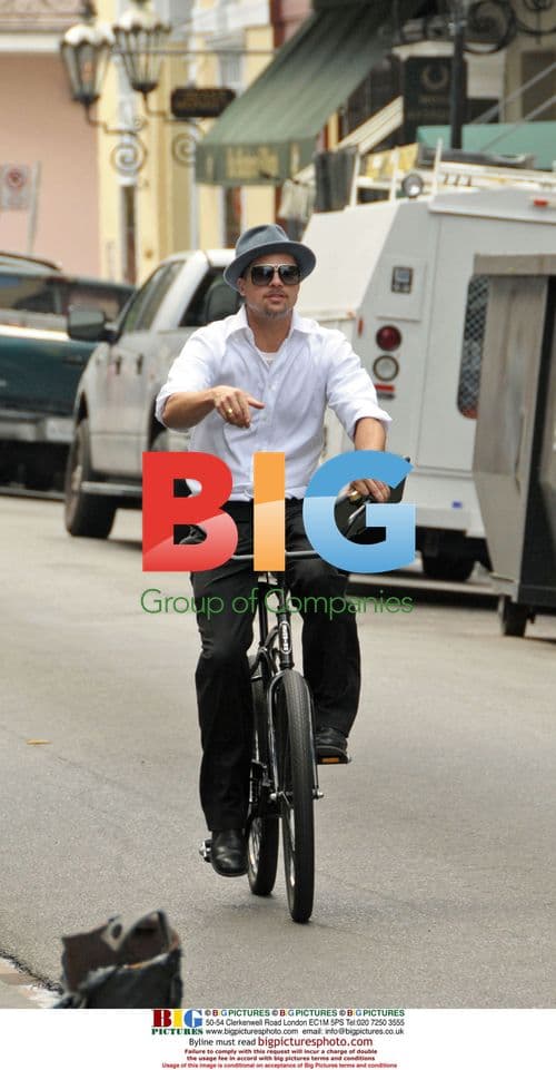 Brad Pitt cycles through New Orleans' French Quarter