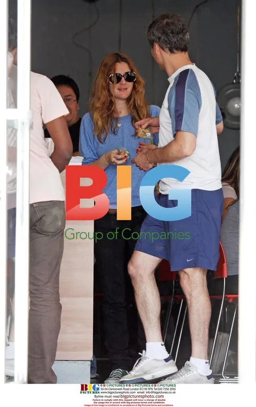Drew Barrymore with mystery man