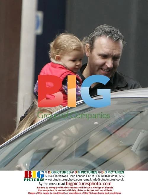 Mark Moraghan leaves hotel with family