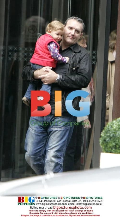 Mark Moraghan leaving hotel with family