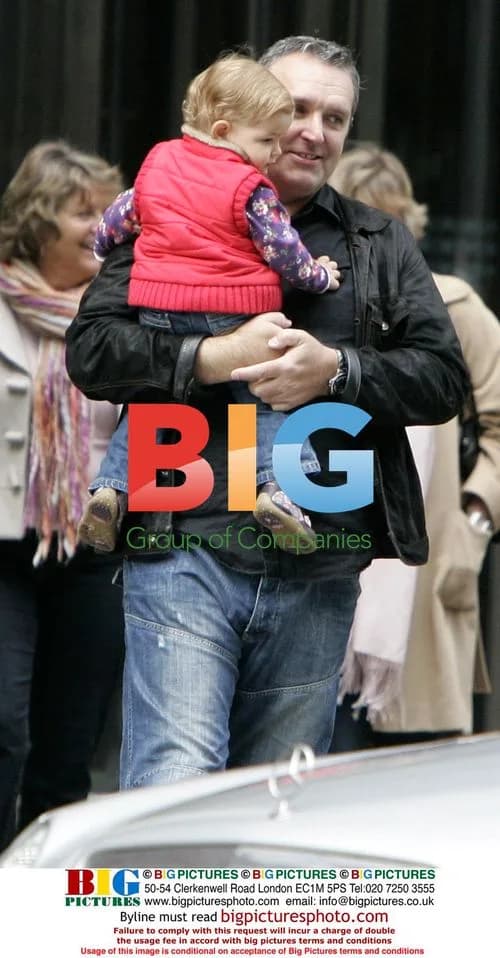 Mark Moraghan leaves hotel with family