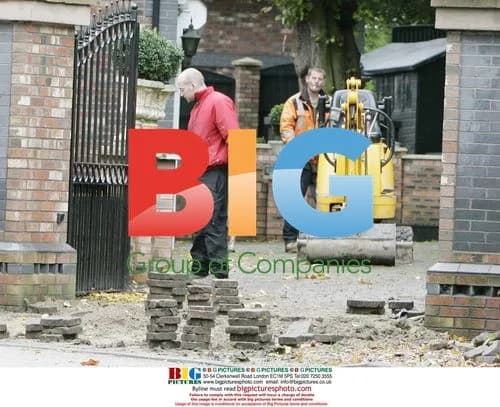Workers on Colette McLoughlin's house, mother of Coleen Rooney