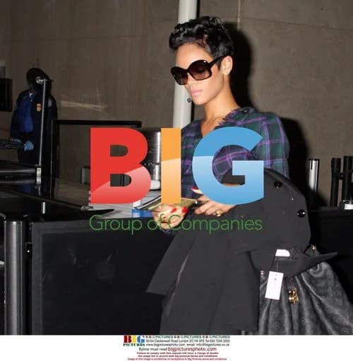 Rihanna Departs LAX