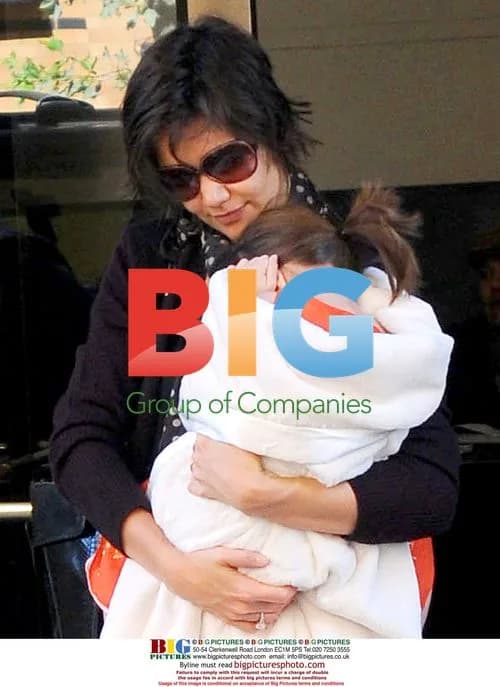 Katie Holmes Carries Daughter Suri in NYC