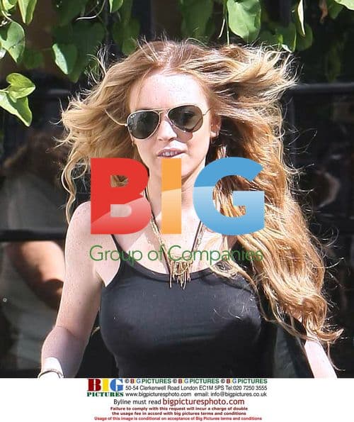 Lindsay Lohan 70s Farah Fawcett Hair