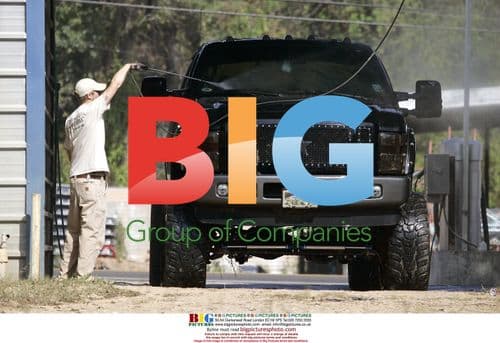 Casey Aldridge washes his truck