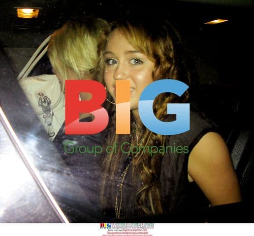 Miley Cyrus at Christian Audigier Show