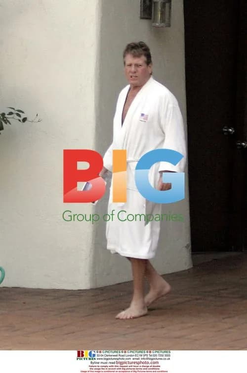 Ryan O'Neal steps out in bathrobe