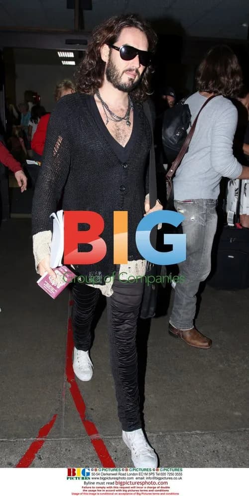 Russell Brand arrives at LAX with friends