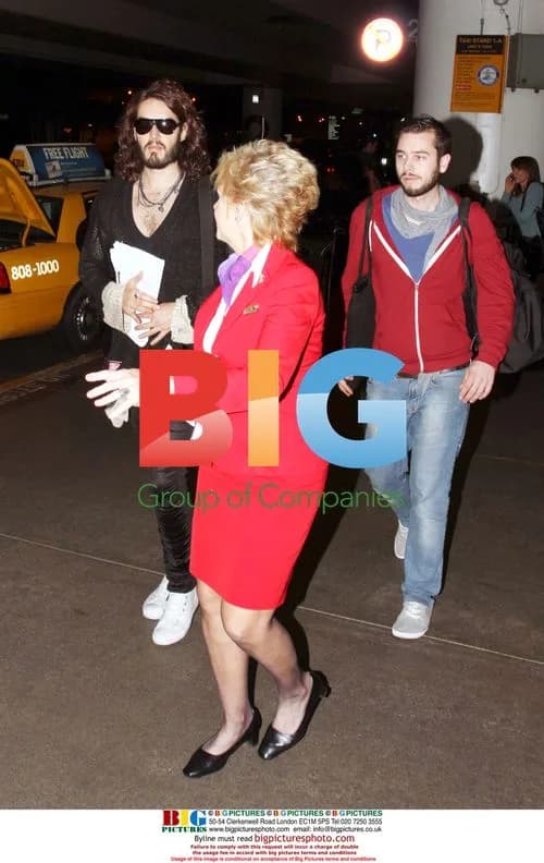 Russell Brand arrives at LAX with friends