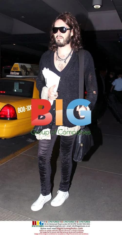 Russell Brand arrives at LAX with friends