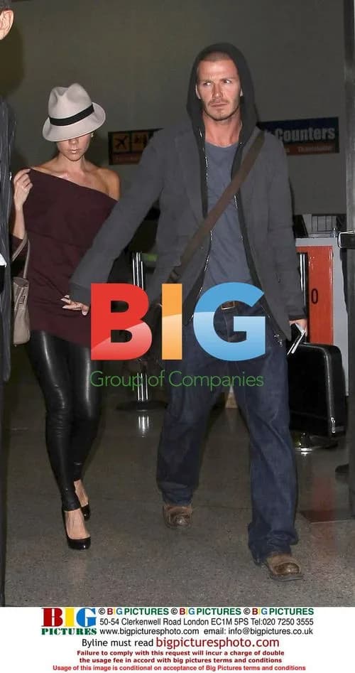 David and Victoria Beckham arrive at LAX