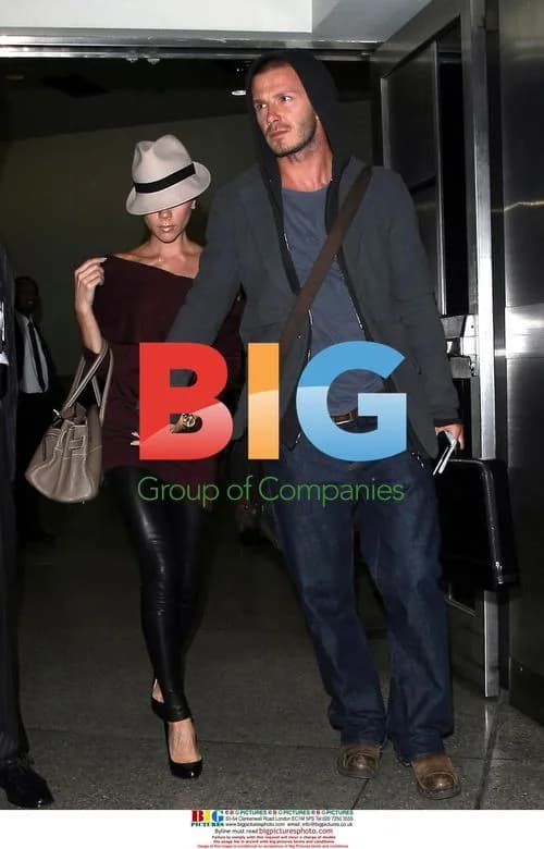 David and Victoria Beckham arrive at LAX