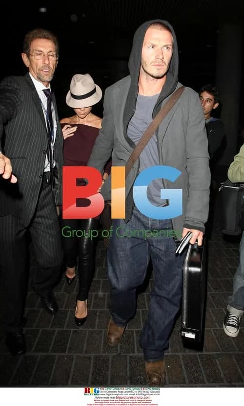 David and Victoria Beckham arrive at LAX airport