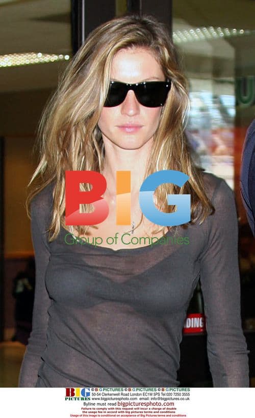 Gisele Bundchen Lands at LAX in Sheer Top