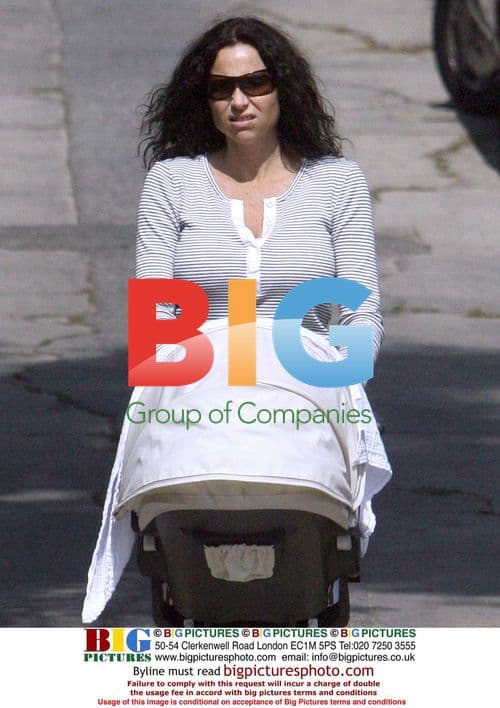 Minnie Driver wheels baby in Hollywood Hills